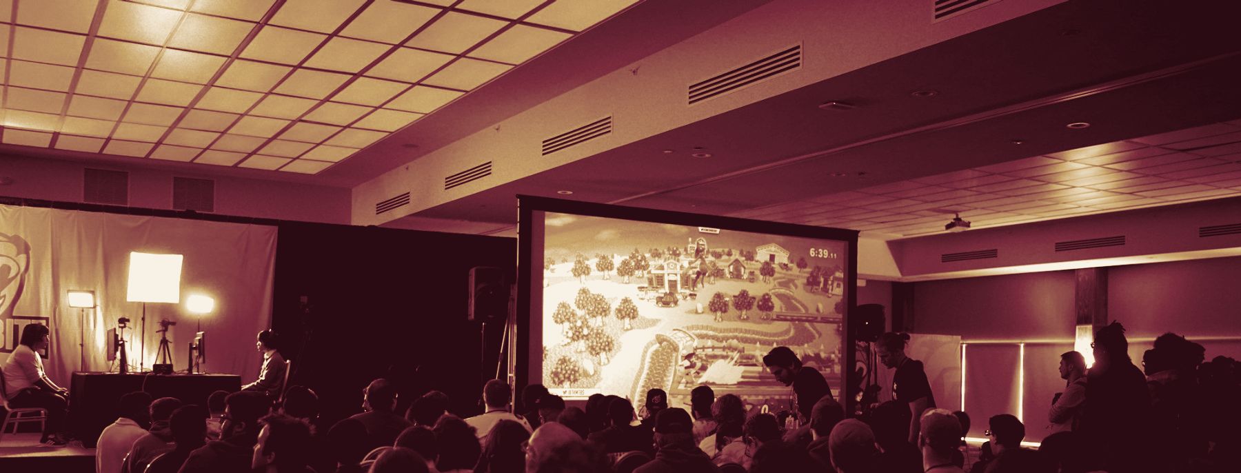 An audience at a conference presentation
